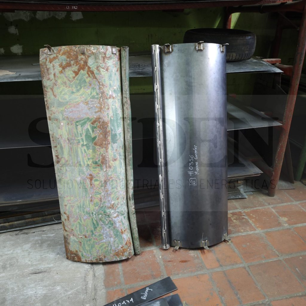 Pieza curva original y la pieza nueva rolada en lámina en el taller de SINDEN
